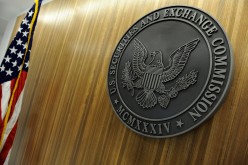 The seal of the U.S. Securities and Exchange Commission hangs on the wall at SEC headquarters in Washington