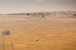 Ingenuity Mars Helicopter attempts its first test flight on Mars near NASA's Perseverance Mars rover in an undated illustration provided
