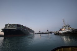 A view shows the container ship Ever Given, one of the world's largest container ships, after it was partially refloated, in Suez Canal, Egypt