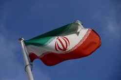 The Iranian flag waves in front of the International Atomic Energy Agency (IAEA) headquarters, before the beginning of a board of governors meeting, 