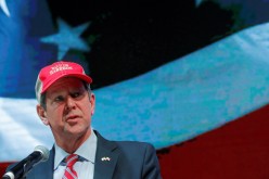 Georgia Governor Brian Kemp speaks at the GA GOP election night event for the run-off election for Georgia’s two Senate seats, 