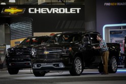 A man looks at a Chevrolet Silverado pickup truck during the 2019 New York International Auto Show in New York City, U.S
