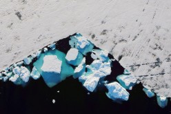An iceberg floats in a fjord near the town of Tasiilaq, Greenland, 