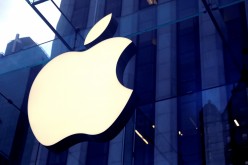 The Apple Inc. logo is seen hanging at the entrance to the Apple store on 5th Avenue in Manhattan, New York, U.S., 