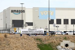 Banners are placed at the Amazon facility as members of a congressional delegation arrive to show their support for workers who will vote on whether to unionize