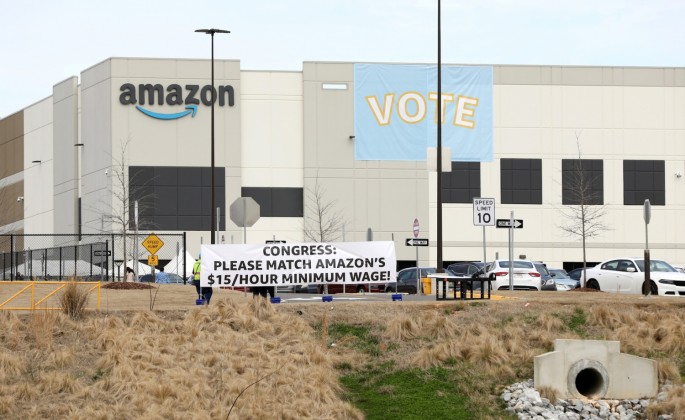 Banners are placed at the Amazon facility as members of a congressional delegation arrive to show their support for workers who will vote on whether to unionize