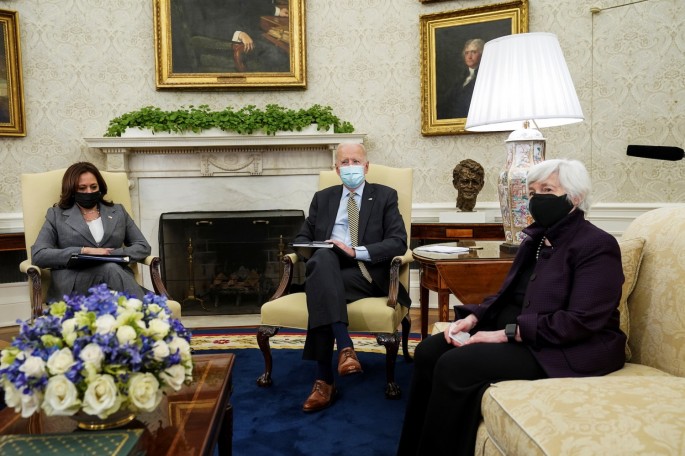 U.S. President Joe Biden is flanked by Vice President Kamala Harris and Treasury Secretary Janet Yellen as he receives the weekly economic briefing