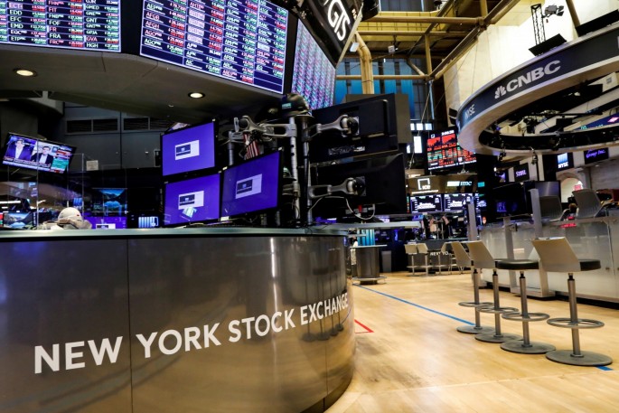 A nearly empty trading floor is seen at the New York Stock Exchange (NYSE) in New York, U.S., 