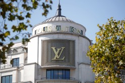 A Louis Vuitton logo is seen outside a store on the Champs-Elysees in Paris, France,