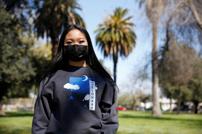 Karlaine Francisco, 17, who was diagnosed with asthma at the age of eight, stands for a portrait at McKinley Park in Stockton, California, U.S.