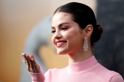 Cast member Selena Gomez poses at the premiere for the film 