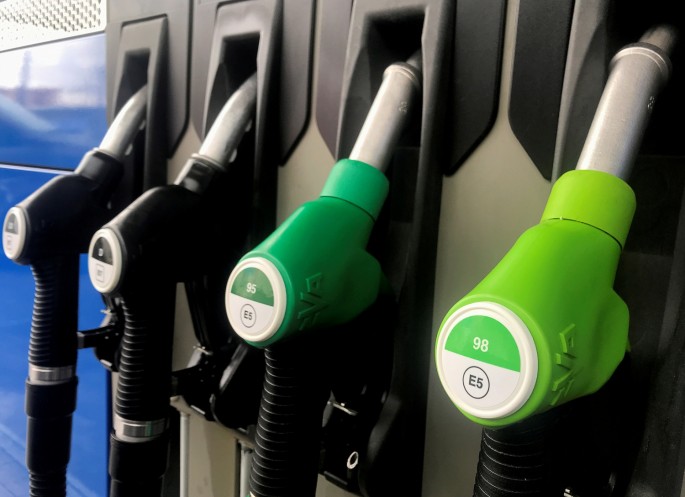 Fuel nozzles with new European labels to standardise pumps in the EU zone are seen at a petrol station in Madrid, Spain,