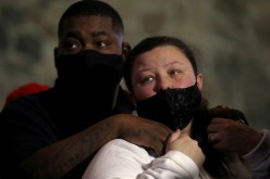 Aubrey and Katie Wright, the parents of Daunte Wright, take part in a news conference with Attorney Ben Crump in response to the charges against former Brooklyn Center police officer Kim Potter,