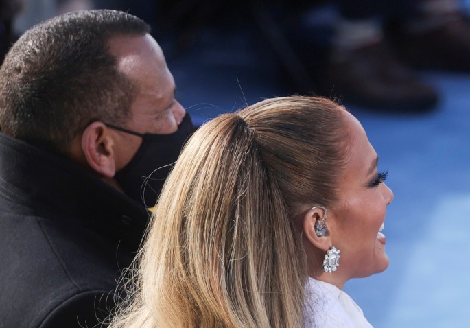 Singer Jennifer Lopez smiles next to Alex Rodriguez during the inauguration of Joe Biden as the 46th President of the United States on the West Front of the U.S. Capitol in Washington