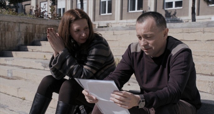 Journalists Mirela Neag (L) and Catalin Tolontan are seen in a still 
