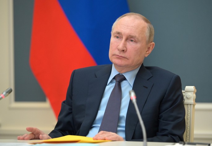 Russian President Vladimir Putin attends a session of the board of trustees of the Russian Geographical Society via a video conference call in Moscow,
