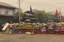 Protesters defend themselves from the troops in Kale, Sagaing region, Myanmar