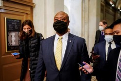 Senator Tim Scott (R-SC) departs after the day's proceedings concluded in the impeachment trial of former U.S. President Donald Trump, on charges of inciting the deadly attack on the U.S. Capitol,