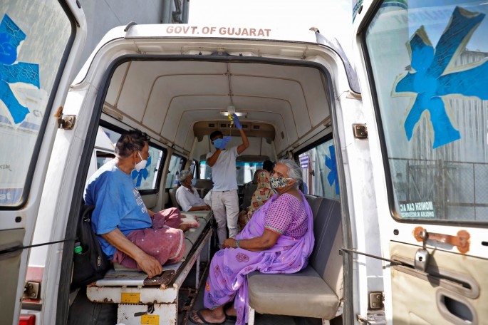 Patients are seen inside an ambulance while waiting to enter a COVID-19 hospital for treatment, amidst the spread of the coronavirus disease (COVID-19) in Ahmedabad,