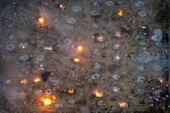 A mass cremation of victims who died due to the coronavirus disease (COVID-19), is seen at a crematorium ground in New Delhi, India