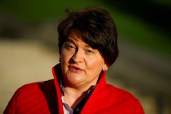 Northern Ireland's First Minister Arlene Foster talks during a television interview outside the Stormont Parliament building in Belfast, Northern Ireland