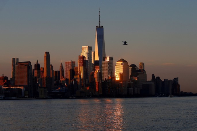  A view of the One World Trade Centre tower and the lower Manhattan skyline of New York City at sunrise as seen from Hoboken, New Jersey, U.S.