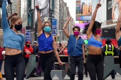  Performers take part in a pop up Broadway performance in anticipation of Broadway reopening in Times Square amid the coronavirus disease (COVID-19) 