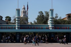 People walk outside Disneyland Park on its reopening day amidst the coronavirus disease (COVID-19) outbreak, in Anaheim, California, U.S.