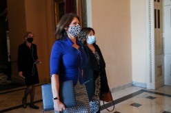 Rep. Cheri Bustos (D-IL) walks through the U.S. Capitol, as Democrats debate one article of impeachment against U.S. President Donald Trump, in Washington, U.S.