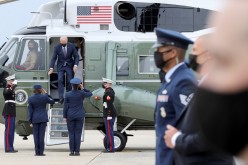 U.S. President Joe Biden and First Lady Jill Biden leave Marine One helicopter to board Air Force One for travel to Virginia from Joint Base Andrews,
