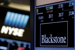 The ticker and trading information for Blackstone Group is displayed at the post where it is traded on the floor of the New York Stock Exchange (NYSE)