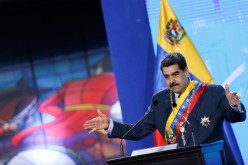 Venezuela's President Nicolas Maduro gestures as he speaks during a ceremony marking the opening of the new court term in Caracas, Venezuela