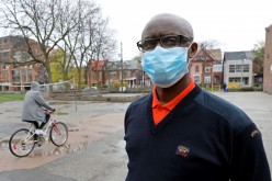 Apollinaire Nduwimana, a Burundian teacher and asylum-seeker who is awaiting a refugee application, poses outside a school near his lodging in Toronto,