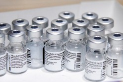 Empty vials of the Pfizer-BioNTech coronavirus disease (COVID-19) vaccine are seen at The Michener Institute, in Toronto, Canada