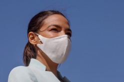U.S. Representative Alexandria Ocasio-Cortez (D-NY) leads a news conference to re-introduce the Green New Deal at the U.S.