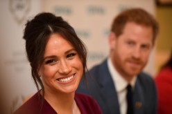 Britain's Meghan, the Duchess of Sussex, and Prince Harry, Duke of Sussex, attend a roundtable discussion on gender equality at Windsor Castle, Windsor,