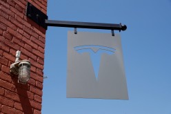The TESLA logo is seen outside a dealership in the Brooklyn borough of New York City,