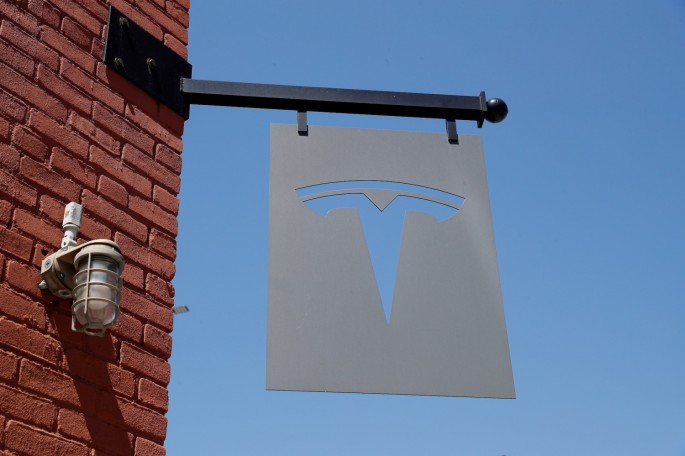 The TESLA logo is seen outside a dealership in the Brooklyn borough of New York City,