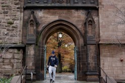 A student walks on the campus of Yale University in New Haven, Connecticut November 12, 2015. More than 1,000 students,