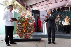 Chinese Ambassador to Mexico Zhu Qingqiao and Mexican President Andres Manuel Lopez Obrador take part in an event where the Mexican government apologizes