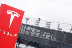 The logo of car manufacturer Tesla is seen at a dealership in London, Britain