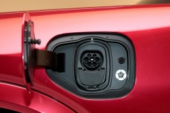 The charging socket is seen on Ford Motor Co's all-new electric Mustang Mach-E vehicle during a photo shoot at a studio in Warren, Michigan, U.S.