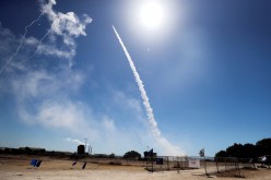 Israel's Iron Dome anti-missile system fires to intercept a rocket launched from the Gaza Strip towards Israel, as seen from Ashkelon, southern Israel