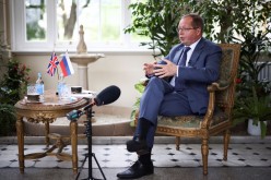 Ambassador of Russia to the United Kingdom Andrei Kelin speaks during an interview with Reuters, inside the residence of the Russian Ambassador, in London
