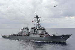 The U.S. Navy guided-missile destroyer USS Curtis Wilbur patrols in the Philippine Sea