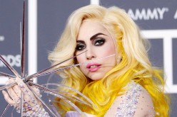 Lady Gaga poses on the red carpet at the 52nd annual Grammy Awards in Los Angeles