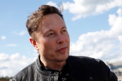 SpaceX founder and Tesla CEO Elon Musk looks on as he visits the construction site of Tesla's gigafactory in Gruenheide,