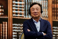 Huawei founder Ren Zhengfei attends a panel discussion at the company headquarters in Shenzhen, Guangdong province, China