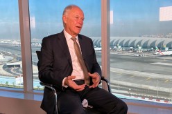 Emirates Airline President Tim Clark gestures as he speaks during an interview with Reuters in Dubai, United Arab Emirates, 