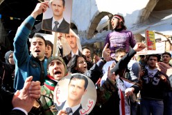 Supporters of Syria's President Bashar al-Assad attend a rally in Damascus 